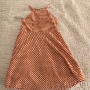 A plad orange and white dress